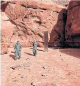  ?? THE ASSOCIATED PRESS ?? Utah state workers found a metal monolith in a remote area. Is it art, aliens or “some good metal”?