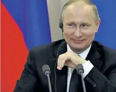  ?? YURI KADOBNOV/THE ASSOCIATED PRESS ?? Russian President Vladimir Putin listens to a question at a joint news conference in Sochi, Russia on Wednesday. The Venezuelan Foreign Ministry announced Friday, that Putin had promised to start delivering food after speaking on the phone with...