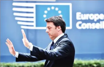  ?? PHILIPPE HUGUEN/AFP ?? Italian Prime Minister Matteo Renzi stepped down yesterday after a crushing referendum defeat that has sent shockwaves around Europe.