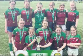  ?? ?? RIGHT: The victorious Kilbehenny side after the Munster final, who are now set for the Aviva Stadium: Ciara Maher, Saoirse Clifford, Lucy Geary, Roisín Dooley, Meabh Kearney, Aoife Noonan, Aoife Casey, Lucy Bailey, Myah Cleary, Ella Kelly and Bree Odgers.