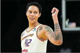  ?? MATT YORK / AP ?? Phoenix Mercury center Brittney Griner smiles during the first half of a WNBA preseason basketball game against the Los Angeles Sparks on May 12 in Phoenix.
