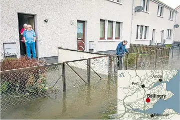  ??  ?? Janet and David Jamieson of Navitie Park watch as neighbour Alexander Wilson leaves his home to get groceries. Picture: Steve Brown.