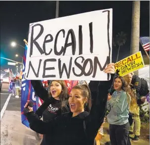  ?? Marcio Jose Sanchez Associated Press ?? ORANGE COUNTY demonstrat­ors in November protest a stay-at-home order and call for the recall of Gov. Gavin Newsom.