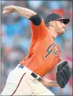  ?? THEARON W. HENDERSON — GETTY IMAGES ?? Starter Chris Stratton pitched six shutout innings Friday against the Phillies. Three relievers finished the shutout.