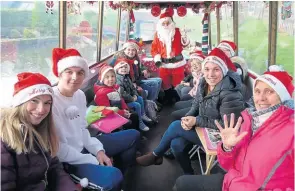  ?? PHOTOS: CCT ?? Happy passengers enjoying a Santa special.