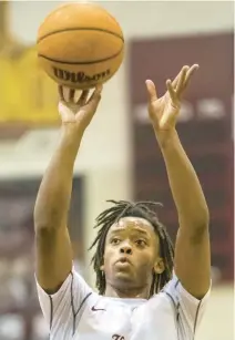  ?? MIKE CAUDILL/FREELANCE ?? King’s Fork guard Sam Brannen, shown earlier this season, scored 18 points and added seven assists in the Bulldogs’ 79-57 state quarterfin­al victory over Matoaca on Friday night.