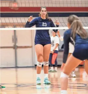  ?? SYDNEY JONES/SPECIAL TO THE POST ?? Dwyer volleyball’s Mila Mucunovic prepares to face Oxbridge Academy on Wednesday.