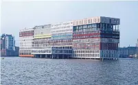  ?? MVRDV ?? The Silodam, designed by Netherland­s-based MVRDV, is a multi-coloured block of housing in Amsterdam’s harbour.