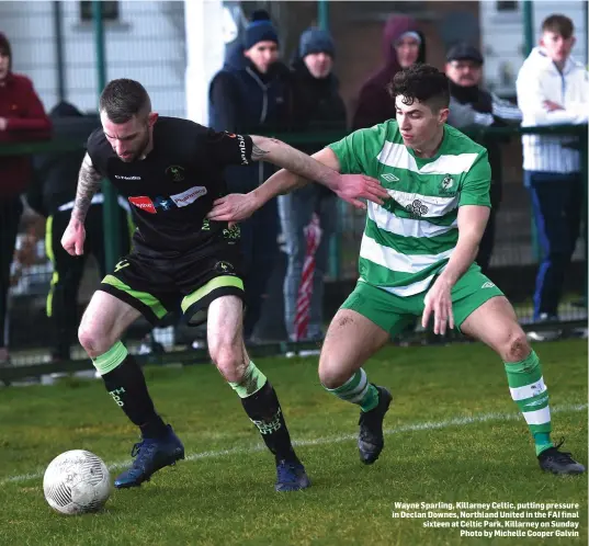  ??  ?? Wayne Sparling, Killarney Celtic, putting pressure in Declan Downes, Northland United in the FAI final sixteen at Celtic Park, Killarney on Sunday Photo by Michelle Cooper Galvin
