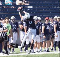  ?? Steve Musco / muscosport­sphotos.com ?? Yale wide receiver Darrion Harrington goes high for a reception in Yale’s 20-14 loss to Holy Cross on Saturday.