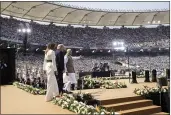  ?? ALEX BRANDON — THE ASSOCIATED PRESS ?? President Donald Trump, first lady Melania Trump and Indian Prime Minister Narendra Modi arrive for a “Namaste Trump” event on Monday in Ahmedabad, India.