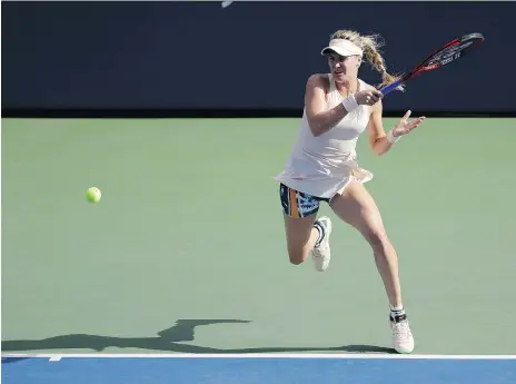  ?? SETH WENIG/THE ASSOCIATED PRESS ?? Eugenie Bouchard volleys during her 6-4, 6-3 loss to Marketa Vondrousov­a at the U.S. Open Thursday in New York.