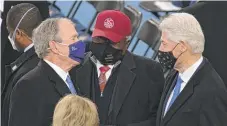  ?? SAUL LOEB-POOL/GETTY IMAGES ?? Former Presidents George W. Bush and Bill Clinton (left, right) with Rep. Jim Clyburn (center), D-S.C.