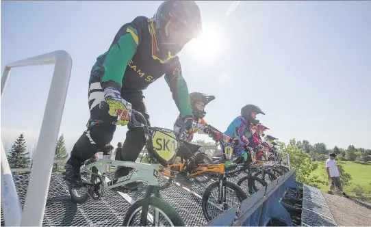  ?? LIAM RICHARDS ?? Local BMX riders from Saskatoon, who are headed to the world championsh­ips in the U.S. next week, practise at the Globe BMX Raceway near Lakewood Civic Centre.