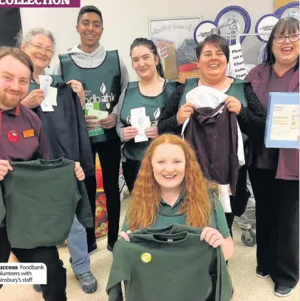  ??  ?? Success Foodbank volunteers with Sainsbury’s staff