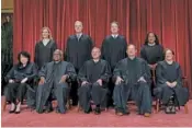  ?? AP PHOTO/J. SCOTT APPLEWHITE ?? Members of the Supreme Court pose for a portrait in 2022 at the Supreme Court building in Washington.