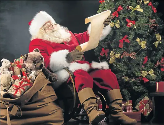  ?? Picture: ISTOCK.COM ?? JOYFUL GIVING: At this time of year Santa has many fans, although not all of them are believers