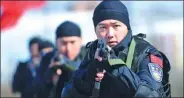  ?? PROVIDED TO CHINA DAILY ?? SWAT team members conduct a training session to mark Internatio­nal Policemen’s Day in Shenyang, Liaoning province, on Tuesday. Local residents and relatives of the officers attended the event.