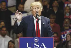  ??  ?? CINCINNATI: In this Dec 1, 2016, photo, President-elect Donald Trump gestures as he speaks during a “USA Thank You” tour event. — AP