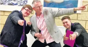  ??  ?? Striking a pose Parent Council Member Mr Feeney with prizewinni­ng pupils