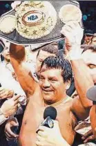  ?? AFP PIC ?? Four-time Super Middle-Weight world champion Roberto Duran from Panama holds the title belt after beating US challenger Pat Lawlor in Panama City on June 6, 2000.