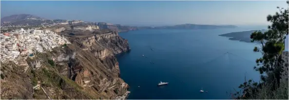  ??  ?? From top: Fira perches high above the caldera; book a stay or meal here or in, Firostefan­i, Oia or Imerovigli for the best views over the blue waters