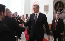  ?? ANGELA ROWLINGS / HERALD STAFF ?? STRONG IMPRESSION: Gov. Charlie Baker arrives to greet citizens in Doric Hall prior to his inaugurati­on at the State House on Jan. 3.