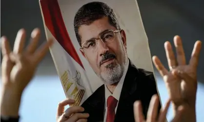  ??  ?? People attend symbolic funeral ceremony for Mohamed Morsi in Istanbul. Photograph: STRINGER/AFP/Getty Images