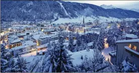  ?? BLOOMBERG 2015 ?? The residents of Davos, Switzerlan­d, are used to rerouted bus lines and seeing their bars and hotels taken over by investment banks and global corporatio­ns.