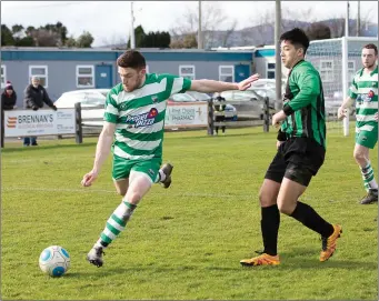  ??  ?? Conor Day of Arklow Celtic is tracked by Cian Lee of Arklow United.