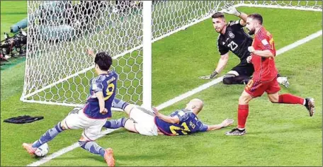  ?? ?? The contentiou­s pull out that resulted into Japan's winner against Spain... yesterday evening