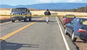  ?? JIM SCHULTZ/REDDING (CALIF.) RECORD SEARCHLIGH­T ?? At least four people were killed and a number more injured during an apparently random shooting spree in Rancho Tehama Reserve, Calif. Neighbors say the man had been firing shots for days.