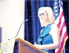  ??  ?? Sinema speaks to supporters after officially winning the US Senate race at the Omni Montelucia resort in Scottsdale. — Reuters photo