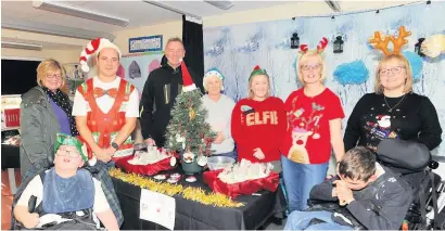  ?? ?? Sweet treats Everyone on hand at the festive fayre was able to sample some tasty biscuits and sweeties