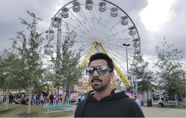  ?? PHOTOS: STEPHEN COOK ?? Sahil Sharma said he was enjoying the K-Days festivitie­s despite the overcast weather.