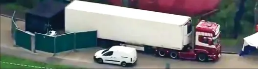  ??  ?? Tragic loss of life: Aerial footage shows police activity around the lorry where the grim discovery of the bodies was made