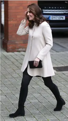  ??  ?? Kate Middleton was pictured out and about visiting a children’s centre in London yesterday. Photo: Paul Hackett/Reuters