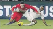  ?? JOHN RAOUX Associated Press ?? SERGINO DEST, left, helps the U.S. avenge a loss to Richie Laryea and Canada in the Nations League.
