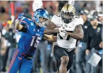  ?? MIKE STONE/AP ?? UCF wide receiver Marlon Williams, right, is among the players who could help the Knights perform at a higher level.