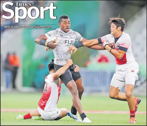  ?? Picture: TRY SPORT IMAGES ?? Fiji’s Isoa Tabu is stopped by the Japan defence at the Cape Town 7s last weekend.