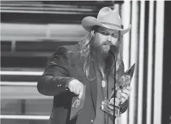  ??  ?? Chris Stapleton accepts the award for album of the year for From A Room: Volume 1 at the recent CMA Awards in Nashville.