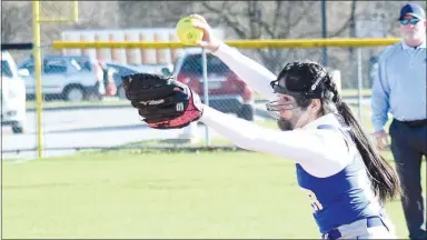  ?? Westside Eagle Observer/MIKE ECKELS ?? Stephanie Sandoval goes into her windup just prior to delivering a pitch to home plate during the Friday night Providence-Decatur softball game at J.B. Hunt softball field in Springdale. Sandoval, an accomplish­ed volleyball player, played her very first game as a softball pitcher.
MIKE ECKELS meckels@nwadg.com