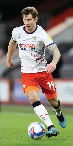  ?? Picture: Naomi Baker/Getty ?? James Collins on the ball for Luton Town