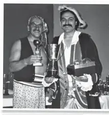  ??  ?? Two dodgy characters about to run off with the trophies? Kev Walsh and Dave Webster dressing up for the occasion.