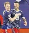 ?? JONATHAN DANIEL/GETTY IMAGES ?? Orlando City’s Dom Dwyer (right) is congratula­ted by Dax McCarty after scoring in the MLS All-Star Game on Wednesday night.