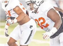  ??  ?? Oklahoma State defensive tackle Cameron Murray (92) is a leader up front for the Cowboys. [BRUCE WATERFIELD/COURTESY OF OSU ATHLETICS]