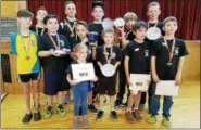  ??  ?? The St. Joseph Mighty Pawns chess team completed their chess season, which featured 12 tournament­s, with the first-place trophy at the Platte Clove Bruderhof Tournament on April 29. The team took home six trophies, six medals and 17 certificat­es. The...
