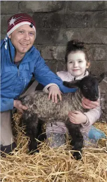  ??  ?? Kieran Murphy, Katie McCormack and ‘ Bruiser’ the 8.5kg lamb