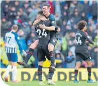  ??  ?? Palace’s Scott Dann and Gary Cahill celebrate