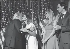  ?? MANDEL NGAN, AFP/ GETTY IMAGES ?? From left, Donald and Melania Trump, daughter Ivanka Trump and husband Jared Kushner in New York on Nov. 9.